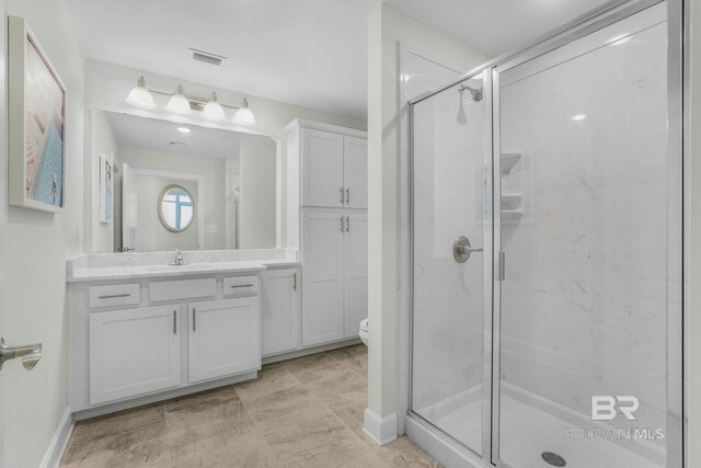 23008 W Perdido Beach Blvd Unit 1905, Orange Beach, AL 36561 - full bathroom with a shower stall, toilet, and vanity
