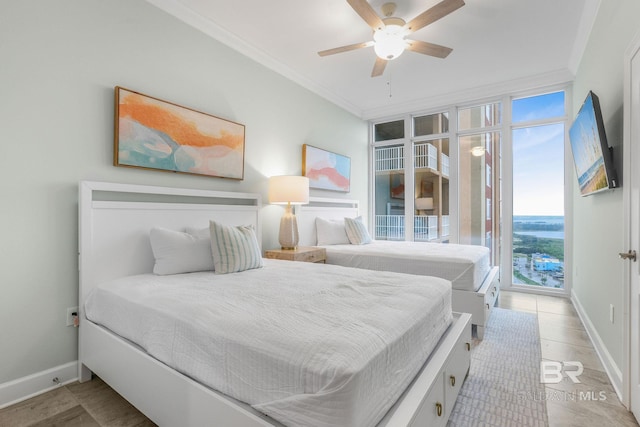 23008 W Perdido Beach Blvd Unit 1905, Orange Beach, AL 36561 - bedroom with multiple windows, ornamental molding, baseboards, and access to exterior