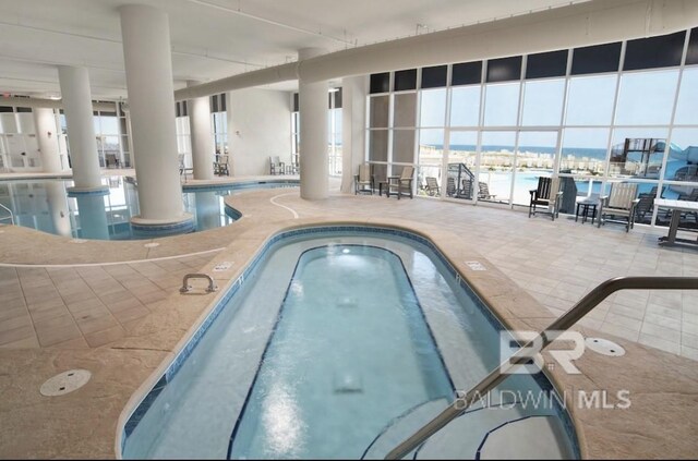 23008 W Perdido Beach Blvd Unit 1905, Orange Beach, AL 36561 - indoor community pool with a water view and a hot tub