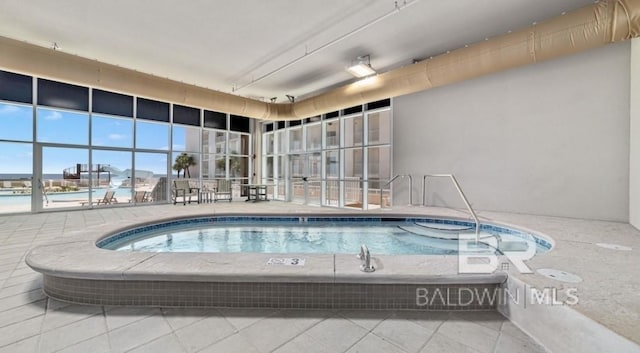 23008 W Perdido Beach Blvd Unit 1905, Orange Beach, AL 36561 - view of pool with a hot tub and a patio area