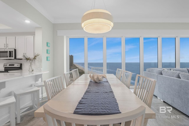 23008 W Perdido Beach Blvd Unit 1905, Orange Beach, AL 36561 - dining room with a water view, crown molding, and recessed lighting