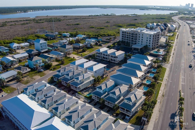 drone / aerial view with a water view