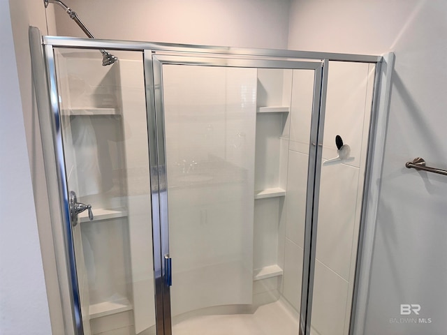 bathroom with an enclosed shower