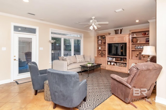 tiled living room with crown molding and ceiling fan