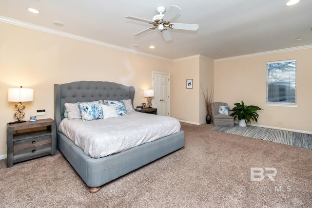 bedroom with crown molding, ceiling fan, and carpet flooring