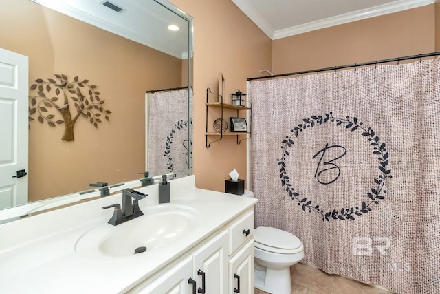 bathroom featuring crown molding, tile patterned floors, vanity, and toilet