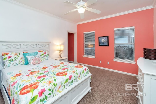 bedroom featuring dark colored carpet, crown molding, and ceiling fan