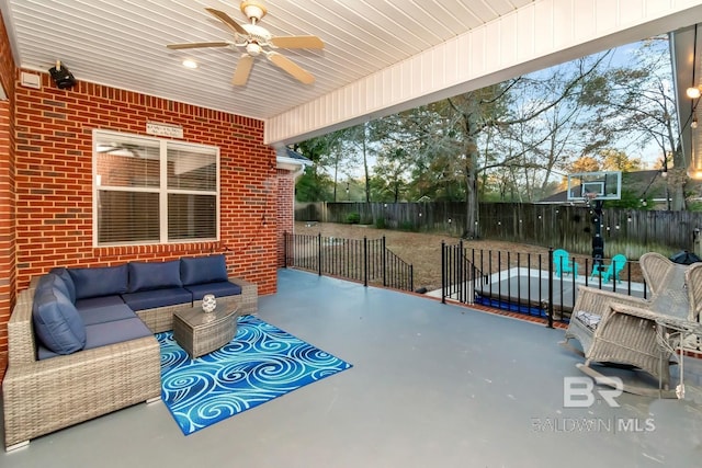 view of patio featuring outdoor lounge area and ceiling fan