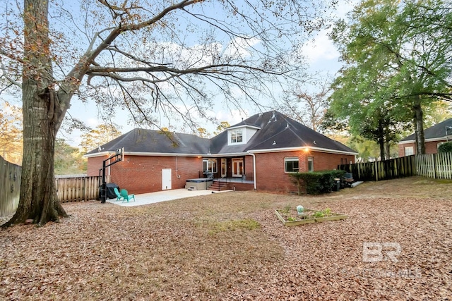 back of house with a patio area