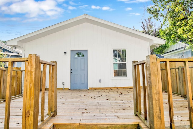 view of outbuilding with fence