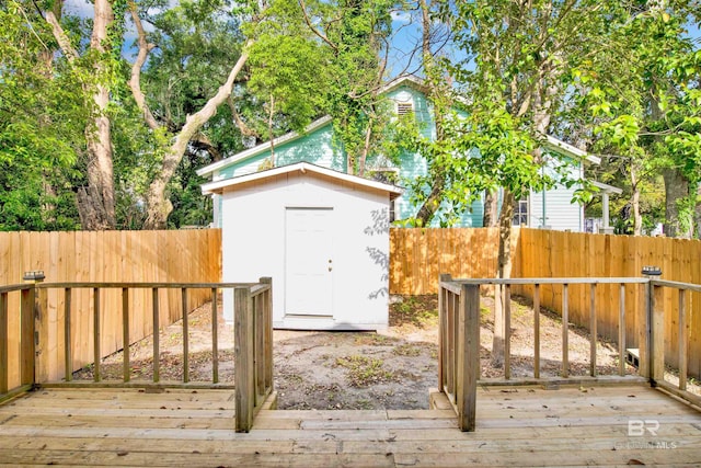 view of shed with a fenced backyard