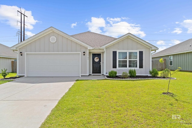 14705 Forsythia Loop, Silverhill, AL 36576 - ranch-style house featuring a garage, a front lawn, driveway, and board and batten siding