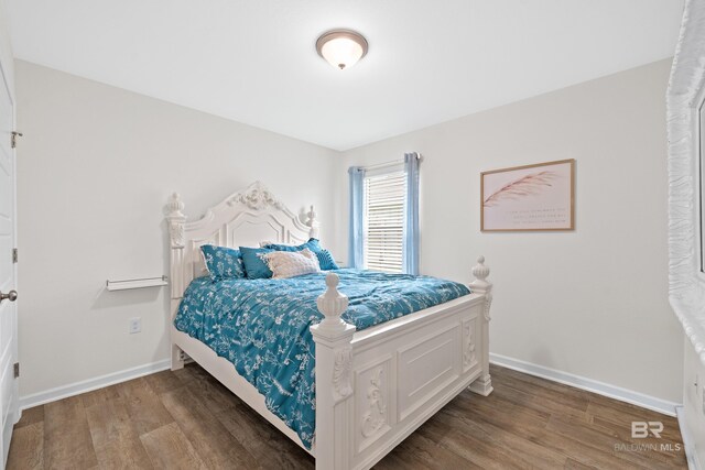 14705 Forsythia Loop, Silverhill, AL 36576 - bedroom featuring wood finished floors and baseboards