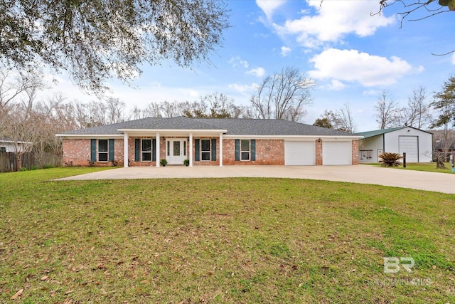 ranch-style home with a garage, brick siding, concrete driveway, and a front yard