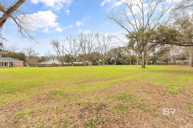 view of yard with fence