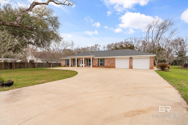 ranch-style home with brick siding, a front lawn, fence, concrete driveway, and a garage