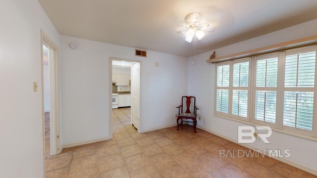 4009 Old Shell Rd Unit C13, Mobile, AL 36608 - unfurnished room featuring baseboards and light tile patterned floors