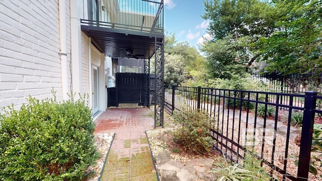 4009 Old Shell Rd Unit C13, Mobile, AL 36608 - view of patio featuring a ceiling fan and a balcony