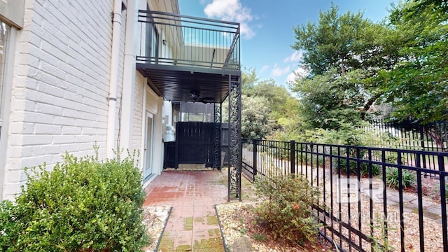 4009 Old Shell Rd Unit C13, Mobile, AL 36608 - view of side of home featuring a balcony, a patio area, and ceiling fan