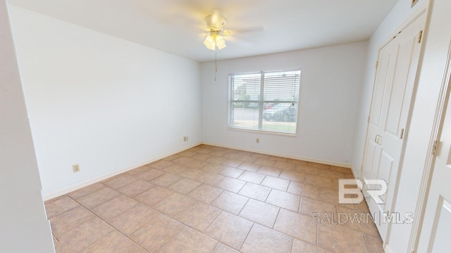 4009 Old Shell Rd Unit C13, Mobile, AL 36608 - unfurnished bedroom featuring light tile patterned floors, baseboards, and a ceiling fan