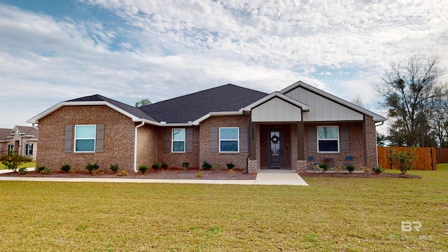 craftsman-style home featuring a front yard