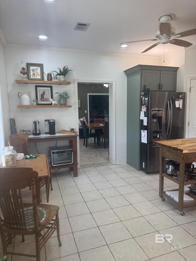 32098 Jessup Ln, Lillian, AL 36549 - living room with ornamental molding, ceiling fan, light tile patterned floors, and recessed lighting