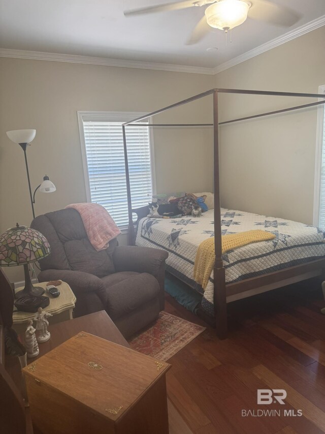 32098 Jessup Ln, Lillian, AL 36549 - bedroom with wood finished floors, crown molding, and a ceiling fan