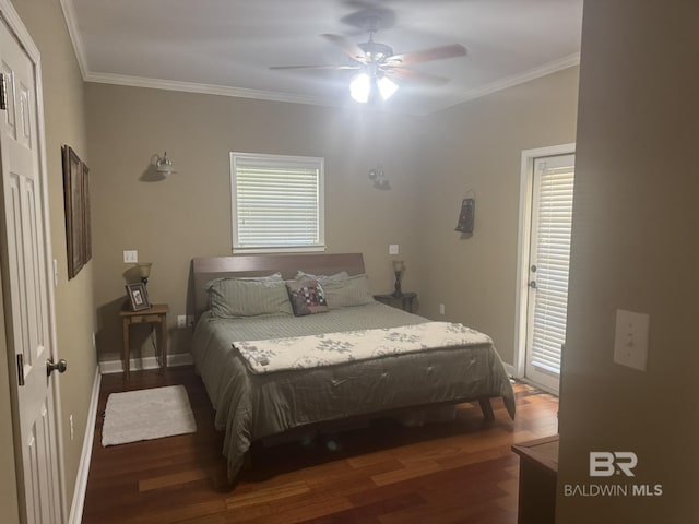 32098 Jessup Ln, Lillian, AL 36549 - bedroom featuring wood finished floors, crown molding, baseboards, and a ceiling fan