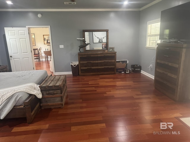32098 Jessup Ln, Lillian, AL 36549 - bedroom featuring crown molding, wood finished floors, and baseboards