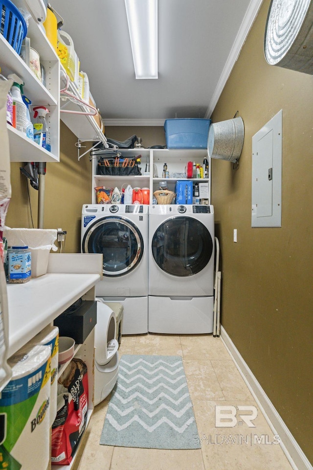32098 Jessup Ln, Lillian, AL 36549 - washroom with electric panel, independent washer and dryer, ornamental molding, tile patterned flooring, and baseboards