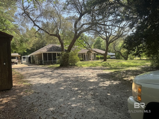 32098 Jessup Ln, Lillian, AL 36549 - view of yard featuring a sunroom