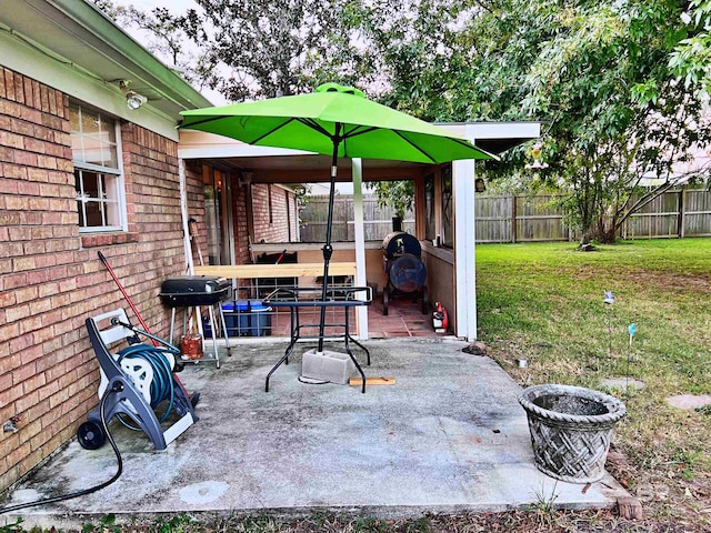 view of patio with a gazebo and a grill