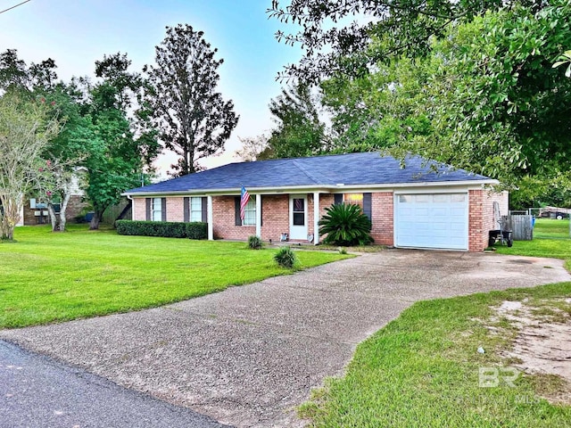 ranch-style house with an attached garage, brick siding, asphalt driveway, and a front yard