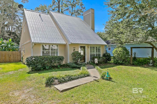 view of front of home with a front yard