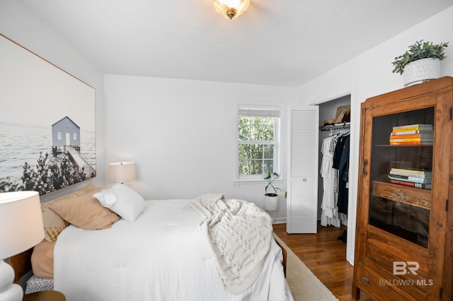 30577 Baldwin St, Perdido Beach, AL 36530 - bedroom featuring wood finished floors and a closet