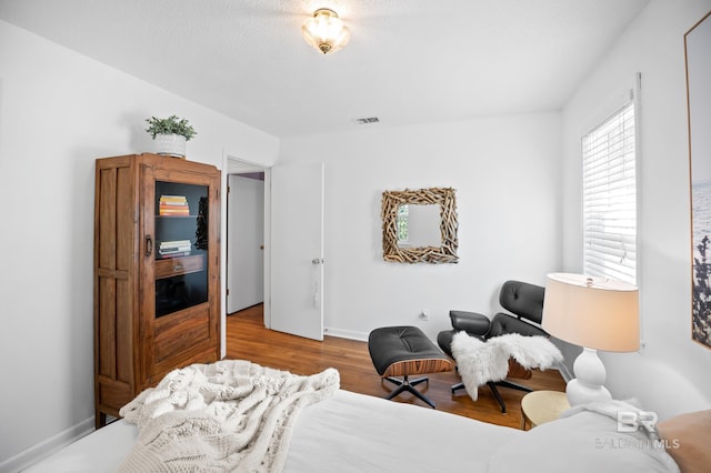 30577 Baldwin St, Perdido Beach, AL 36530 - bedroom featuring wood finished floors and baseboards