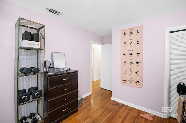 30577 Baldwin St, Perdido Beach, AL 36530 - bedroom with baseboards and light wood finished floors