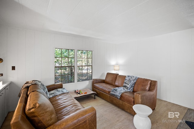 30577 Baldwin St, Perdido Beach, AL 36530 - living room with wood finished floors and a decorative wall
