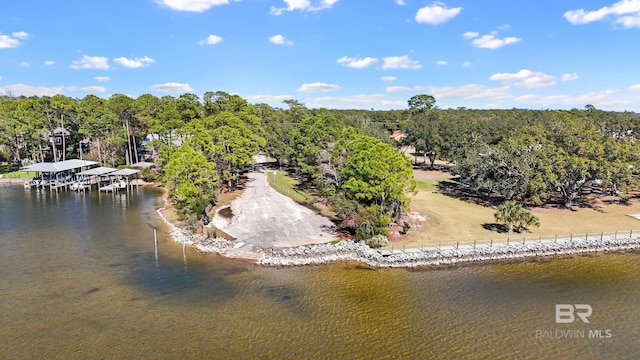 30577 Baldwin St, Perdido Beach, AL 36530 - drone / aerial view of a nearby body of water and a heavily wooded area
