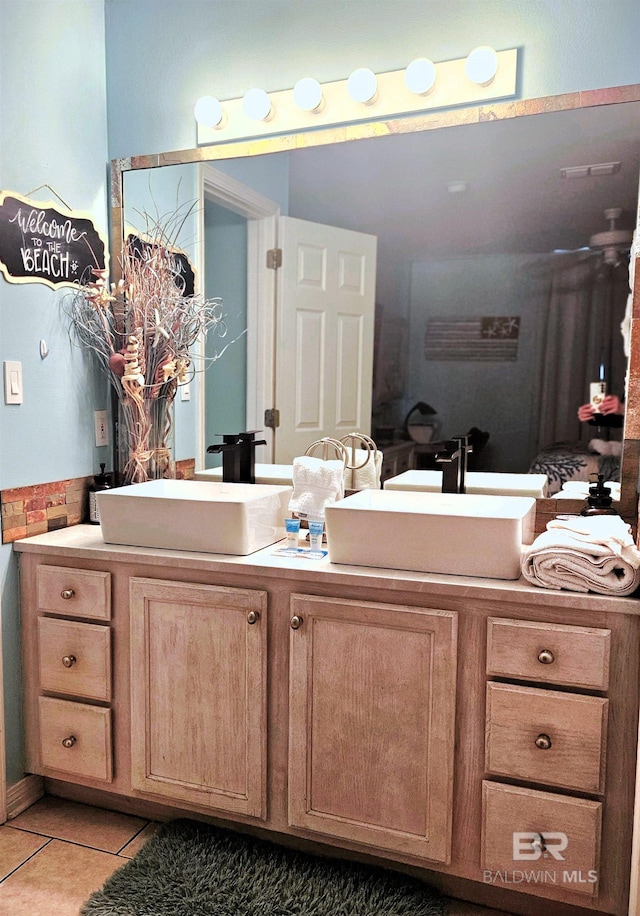 bathroom featuring tile patterned floors and vanity