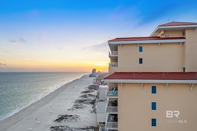 exterior space with a beach view