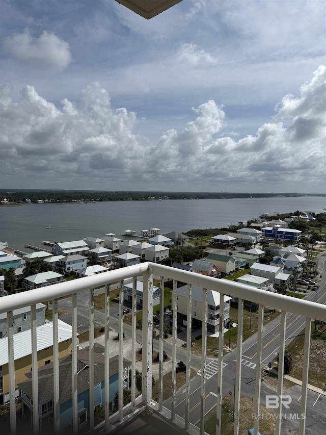 balcony featuring a water view