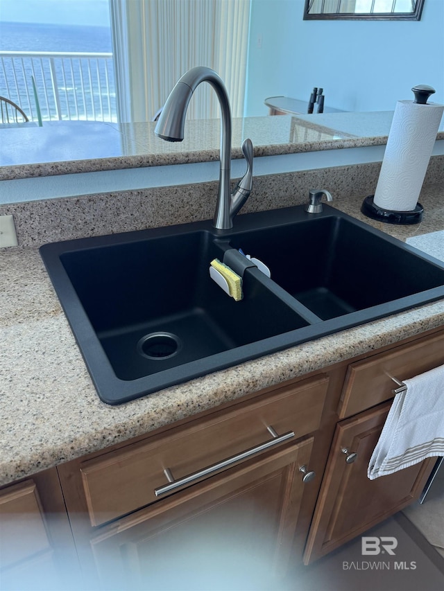 interior details featuring a sink