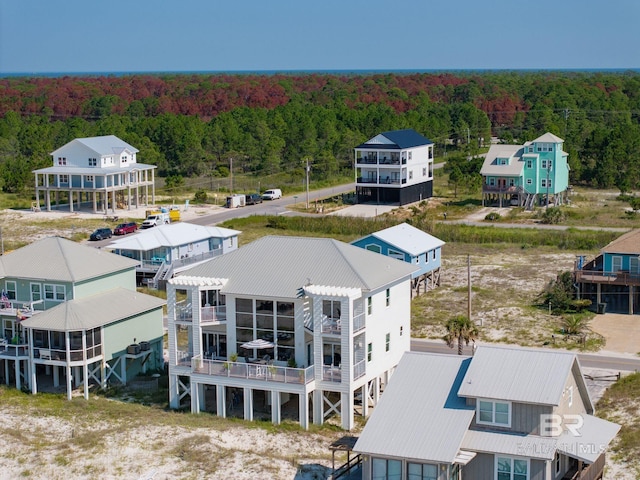 birds eye view of property with a forest view