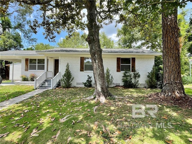 ranch-style house with a front yard