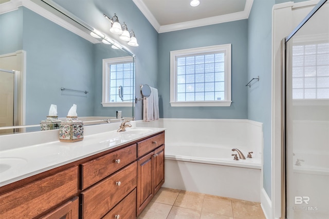 full bathroom featuring a sink, a stall shower, double vanity, a garden tub, and tile patterned flooring