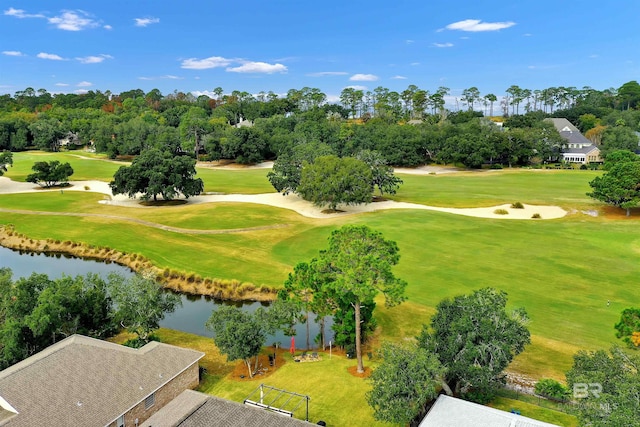 aerial view with a water view and view of golf course