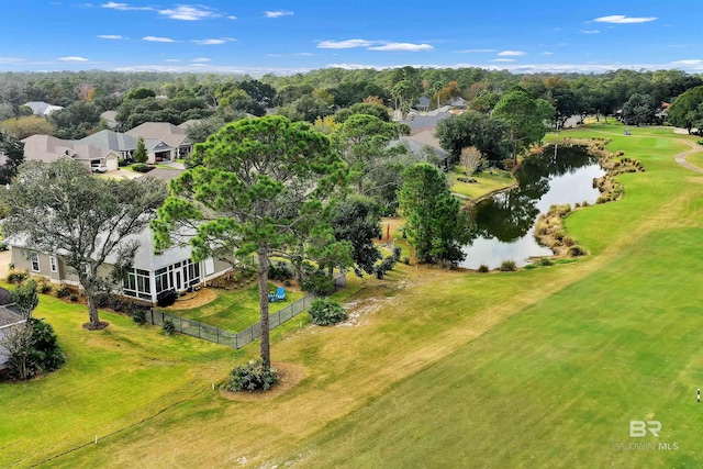 birds eye view of property featuring a water view, a residential view, and view of golf course