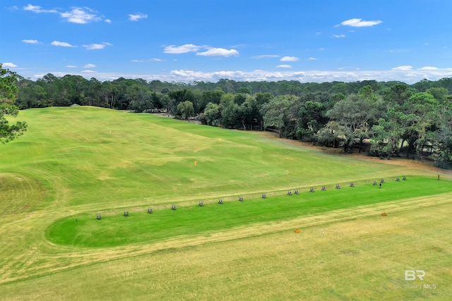 surrounding community featuring view of golf course