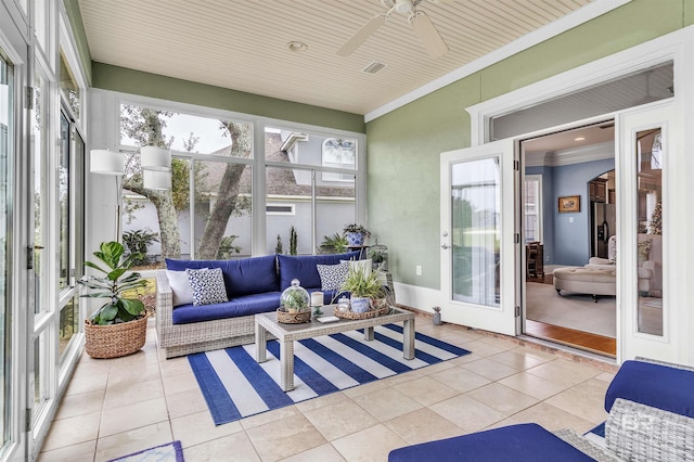 sunroom / solarium with tile patterned floors, ceiling fan, an outdoor hangout area, and crown molding